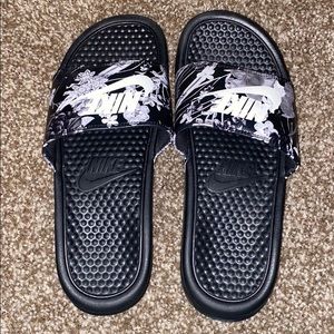 black and floral nike slides